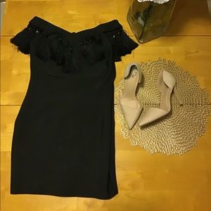 Black off the shoulders dress.